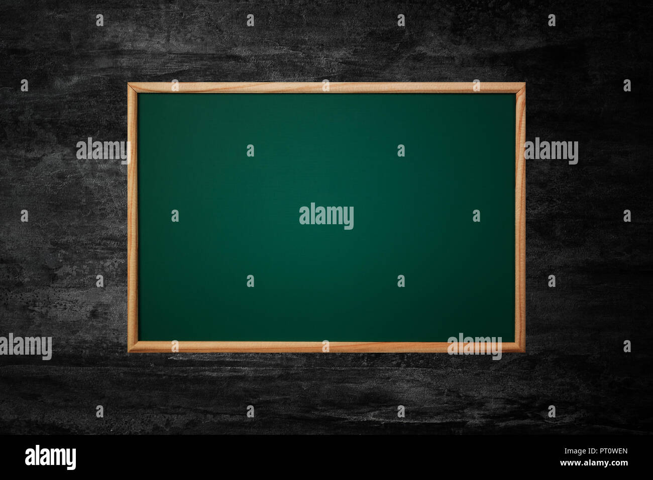 Empty green chalkboard or school board background and texture with wood ...