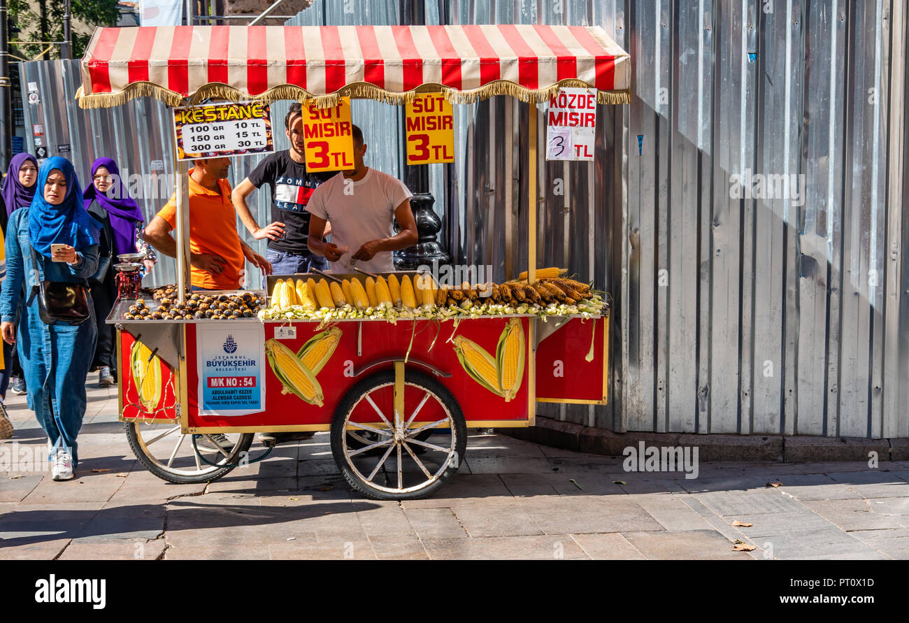 Istanbul, Turkey, September 2018: Mobile kitchen stand for baked chestnuts, cooked corn and grilled corn. Stock Photo