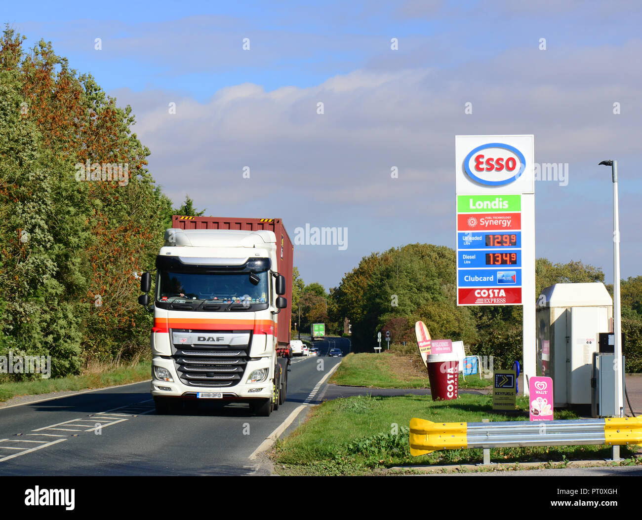 lorry driver passing petrol station driffield yorkshire united kingdom Stock Photo