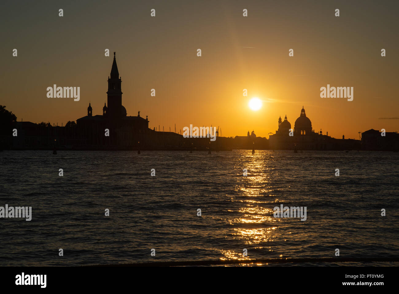 Sunset over St Giorgio Maggiore  and Santa Maria della Salute Venice Stock Photo