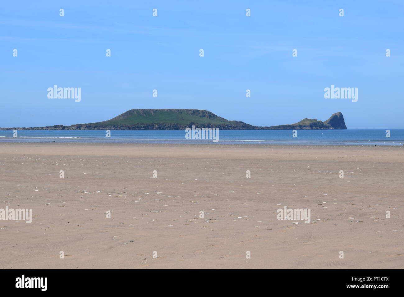 The island off Rhossili Beach Stock Photo