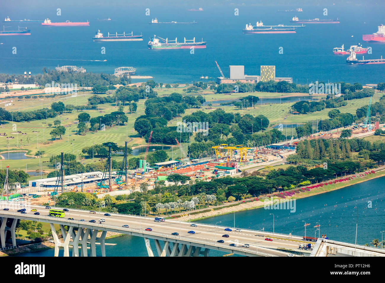 Singapore - August 18 2018: Aerial bird's eye view of Marina East Singapore featuring East Coast Expressway, Gardens by the Bay East, sea and ships Stock Photo