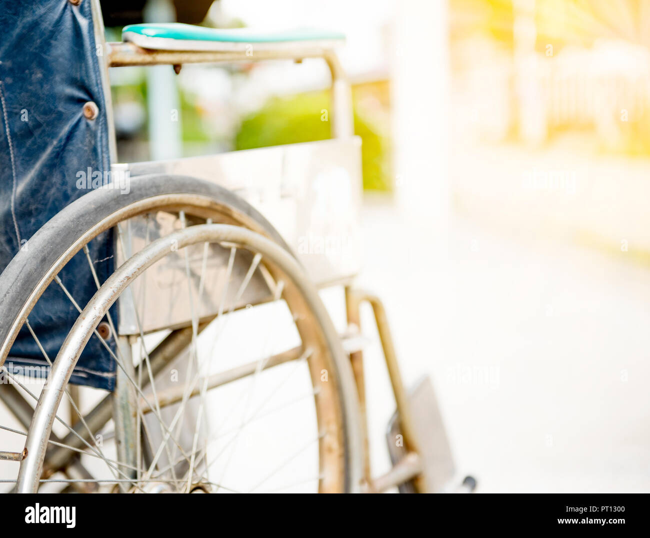 old and broken wheelchair at hospital, disability wheelchaire Stock