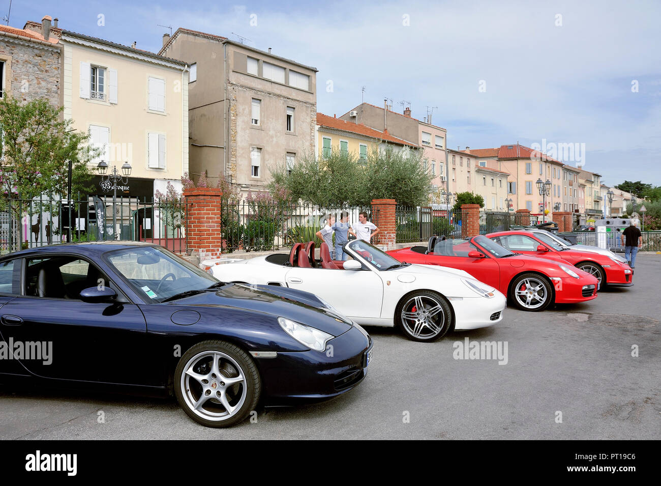 Porsche sports car rally on a parking lot in the city of Ales in the ...