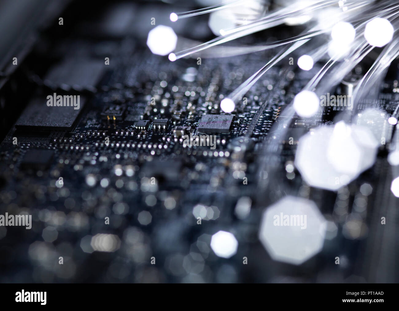 Fibre optics, hardware, mother board in the background Stock Photo