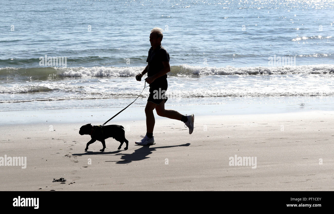 man-the-sunny-weather-on-the-beach-in-folkestone-hi-res-stock