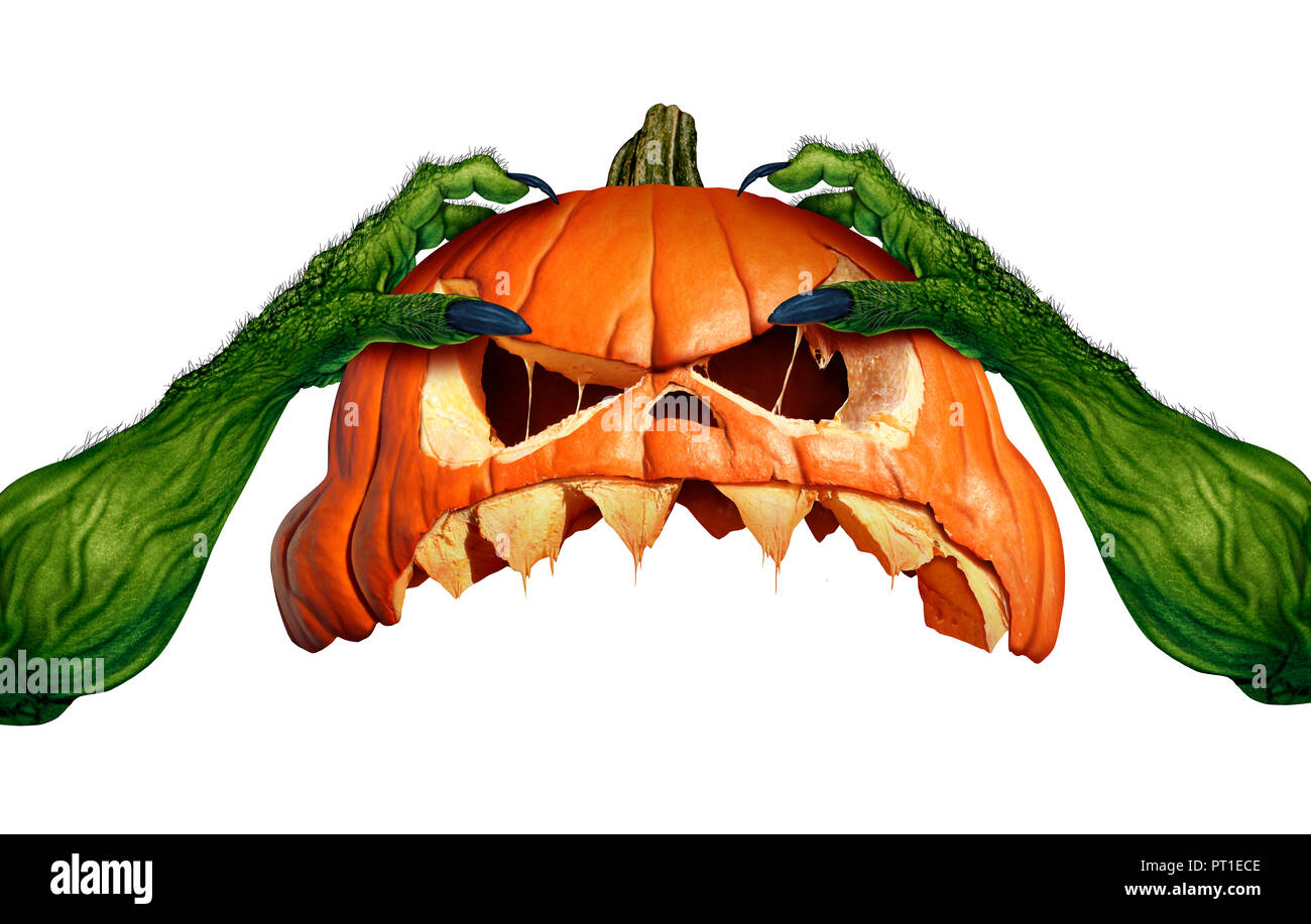 Creepy monster halloween pumpkin green hand holding a scary pumpkin head jack o lantern that is as an autumn symbol for horror and seasonal ritual. Stock Photo