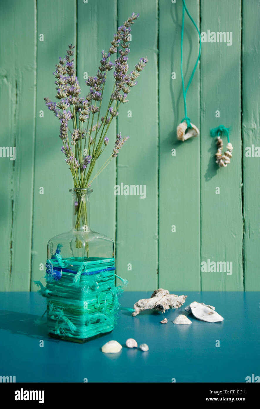 Lavender blossoms in upcycled flower vase Stock Photo Alamy