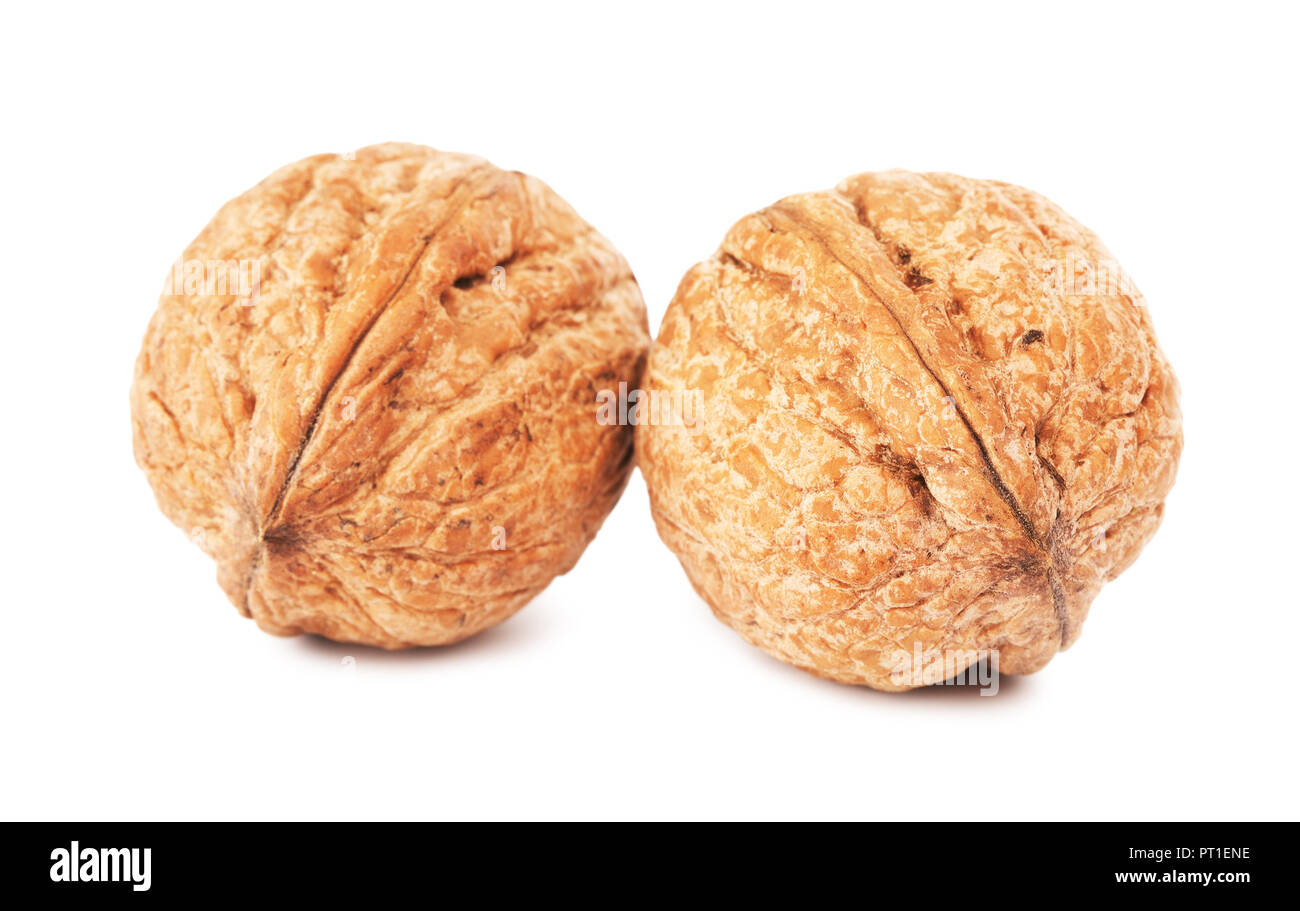 two walnuts in a shell, isolated on white background Stock Photo