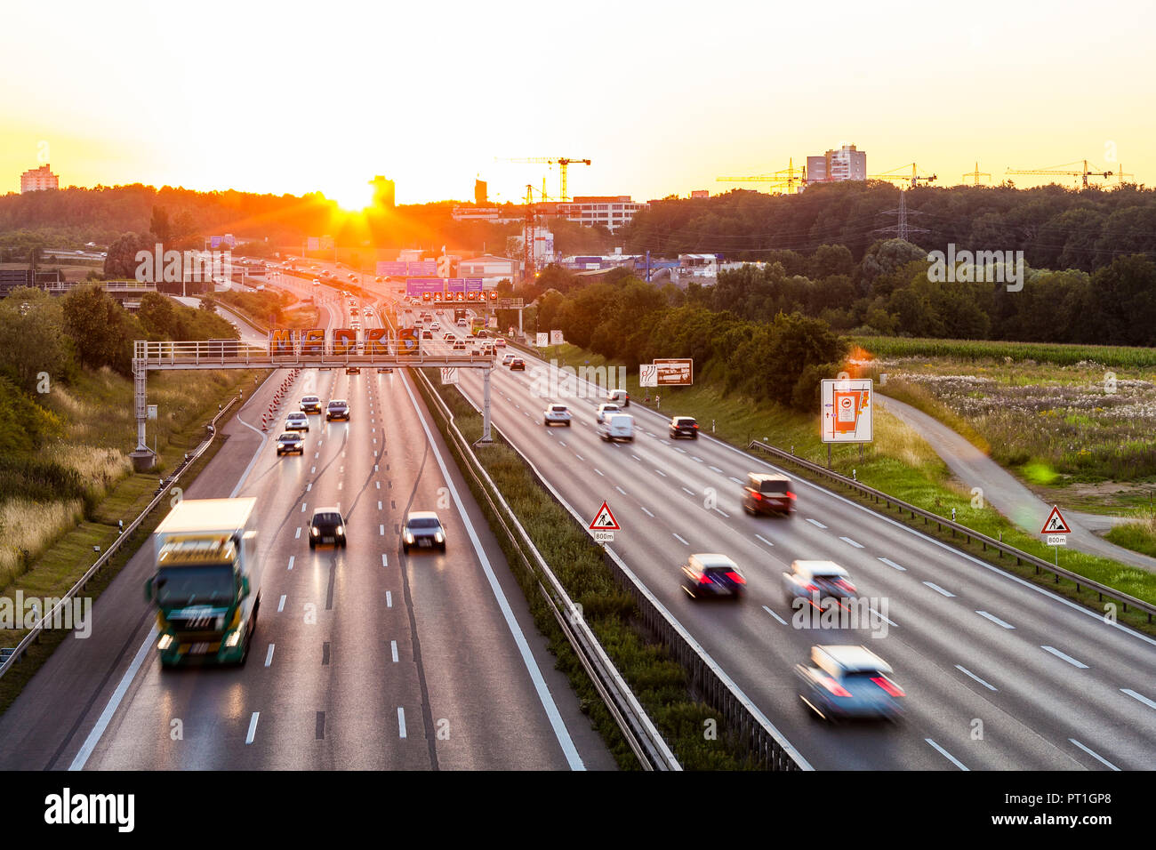 Germany, Baden-Wuerttemberg, Stuttgart, Autobahn A8 in the evening Stock Photo