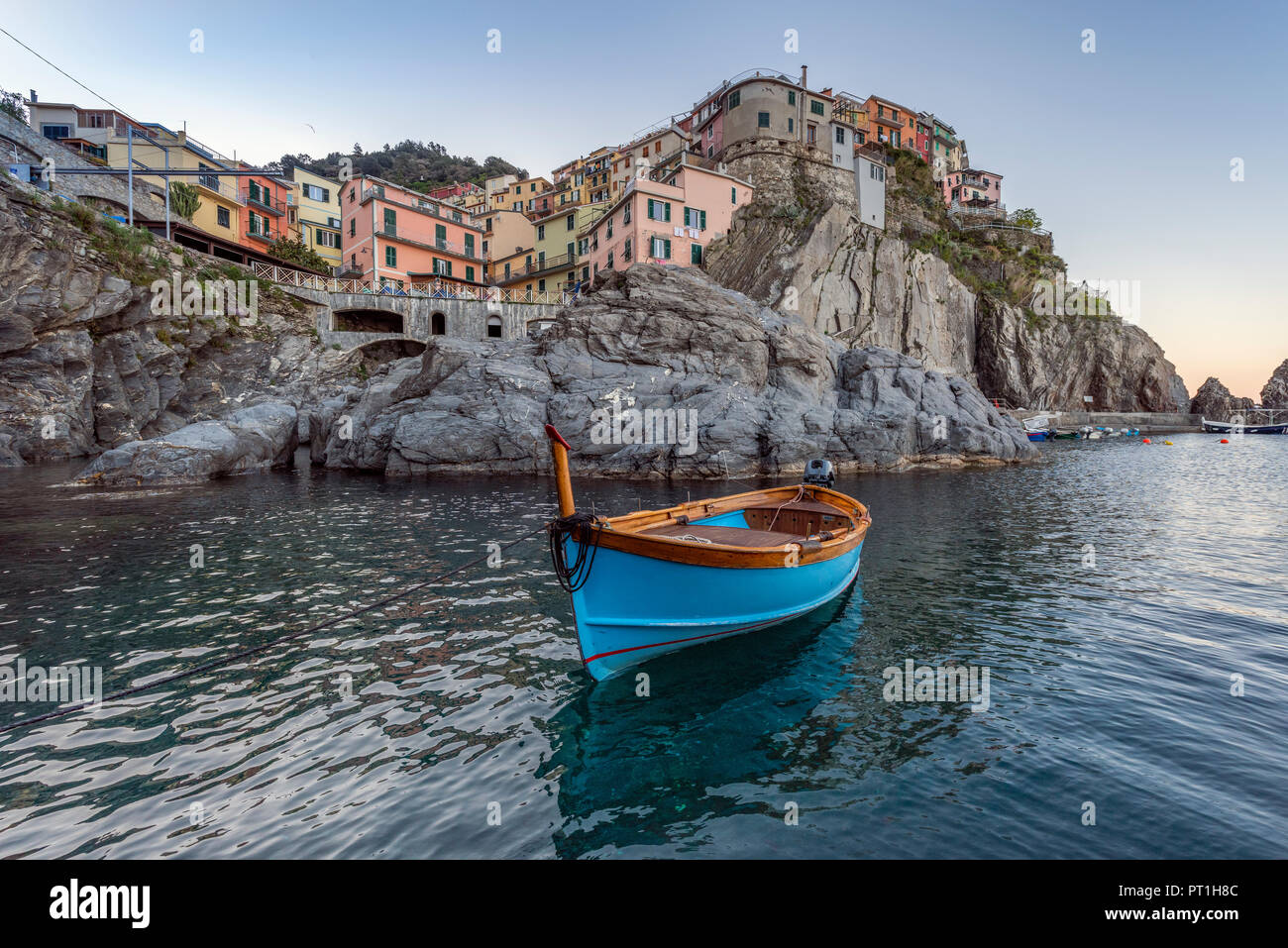 Italy, Liguria, La Spezia, Cinque Terre National Park, Manarola, empty blue fishing boat Stock Photo