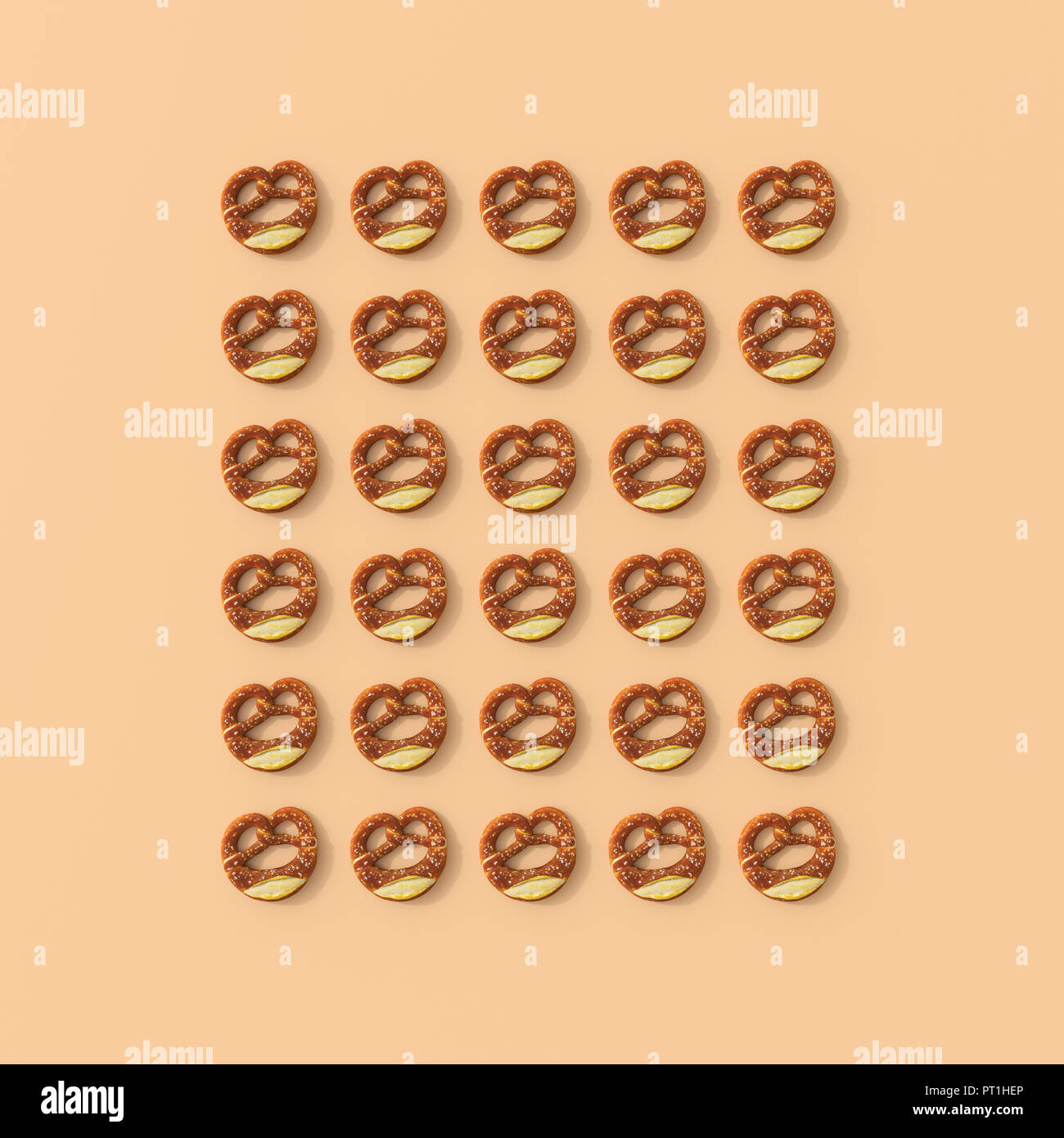 3D rendering, Rows of pretzels on orange background Stock Photo