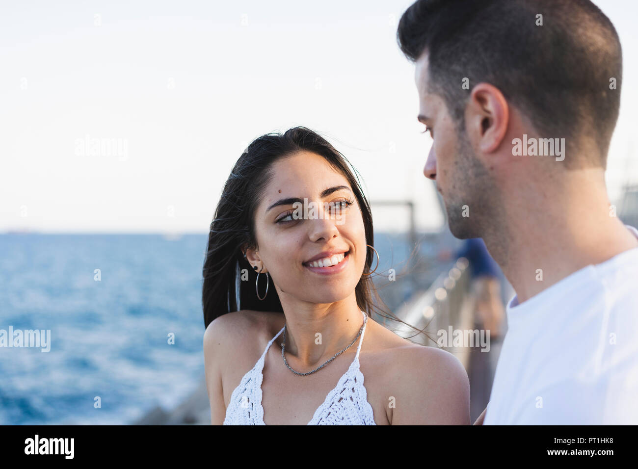 Standing young couple hi-res stock photography and images - Alamy