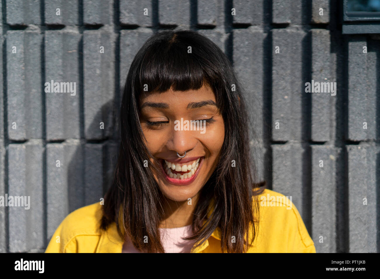 Portrait of laughing young woman Stock Photo