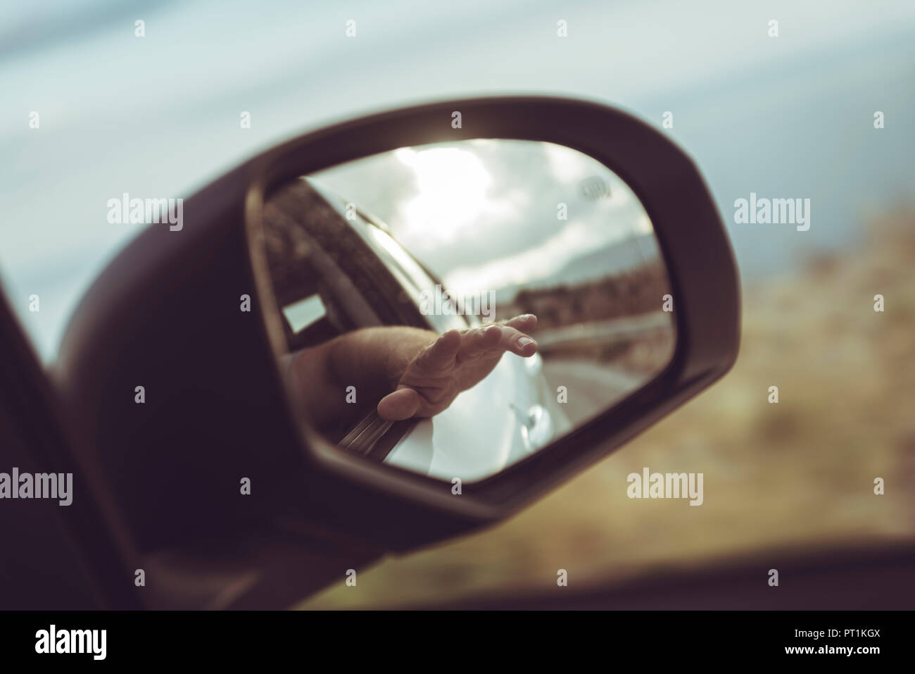 Greece, Crete, hand in rear-view mirror of a car Stock Photo - Alamy