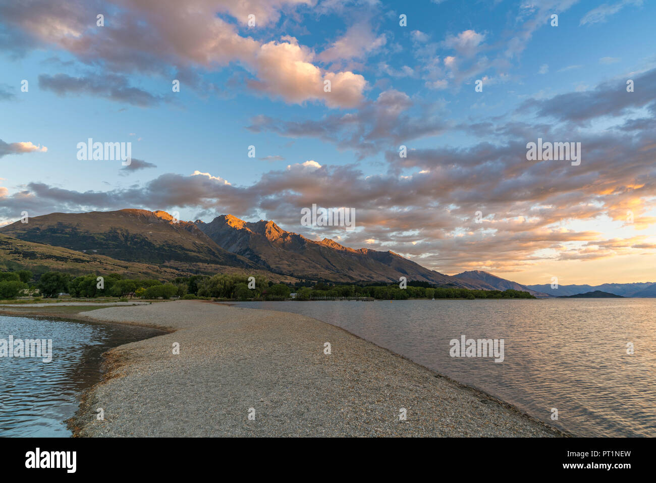 Clouds in the sky above Lake Wakatipu and mountains at sunset, Glenorchy, Queenstown Lakes district, Otago region, South Island, New Zealand, Stock Photo