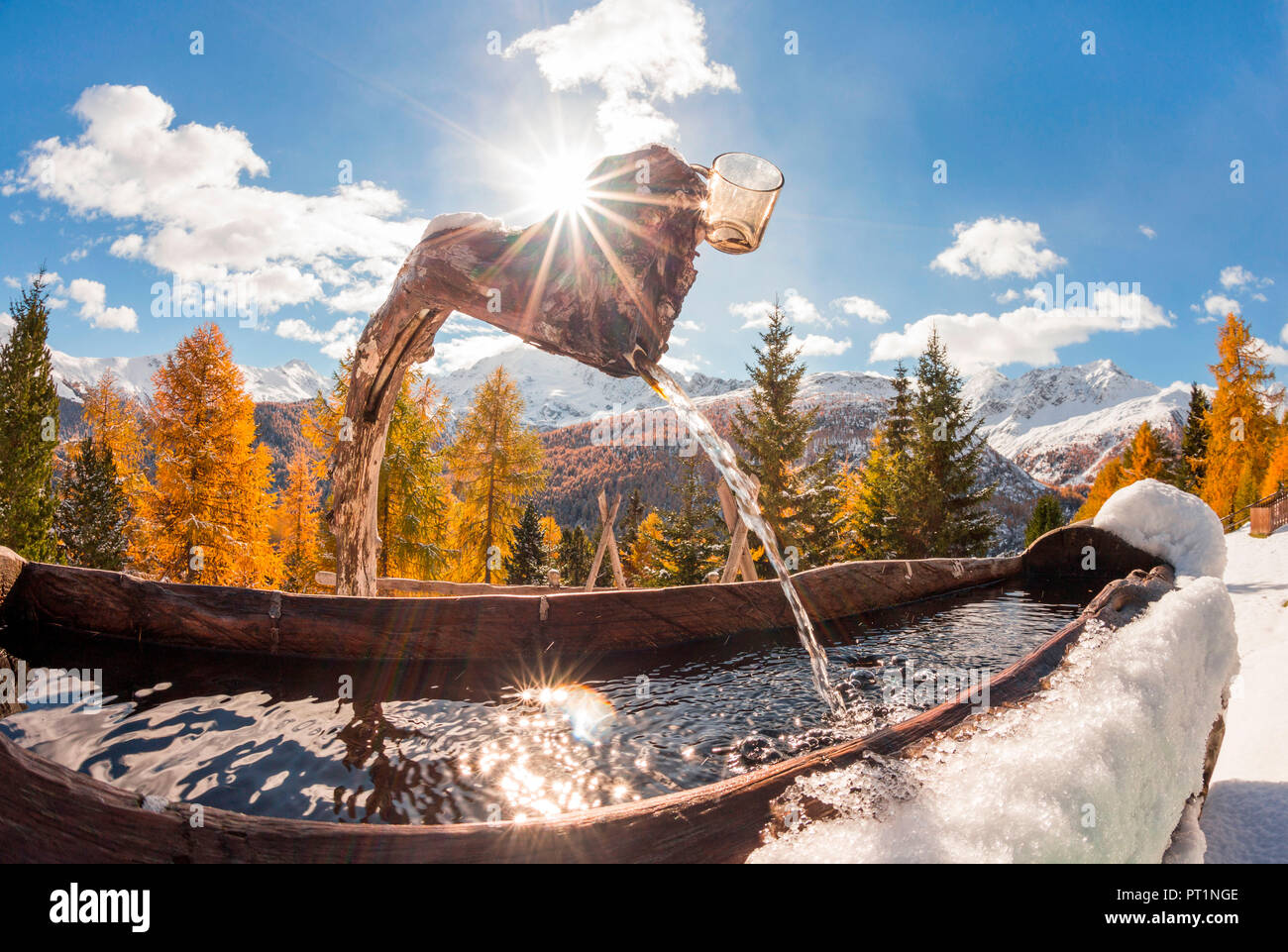 Alpin fountain during a sunny day, Arnoga, Valtellina, Lombardy Stock Photo