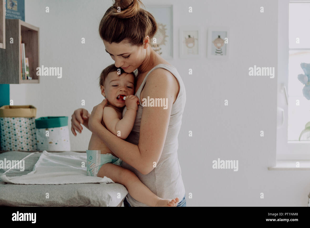 Mother Changing Diapers Of Her Baby Son Stock Image Mother Changing Diapers Of Her Baby Son Stock Image