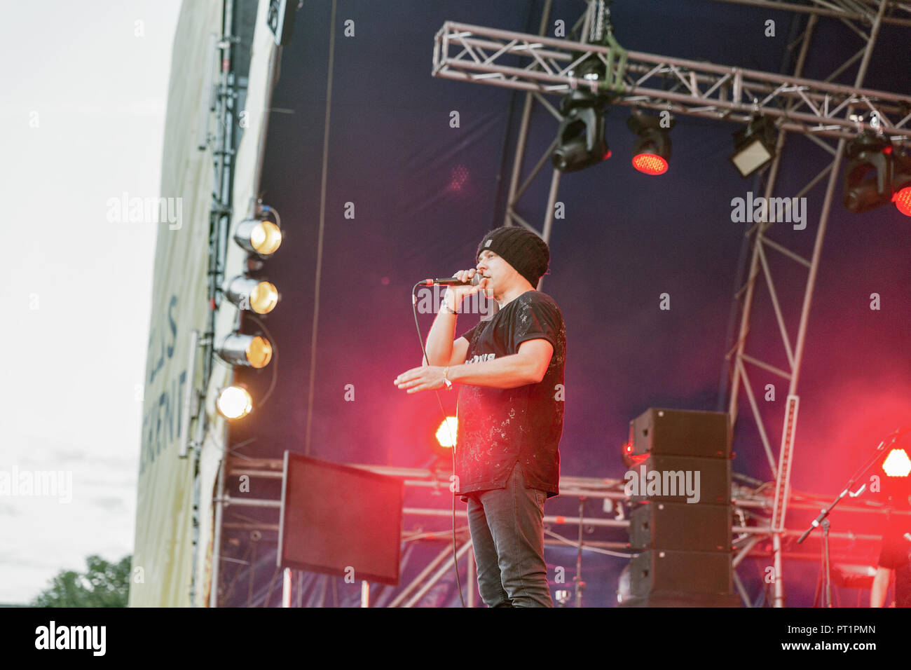 KIEV, UKRAINE - JULY 05, 2018: Ukrainian hip-hop band TNMK and Fozzi, lead singer and frontman performs live at the Atlas Weekend Festival in National Stock Photo