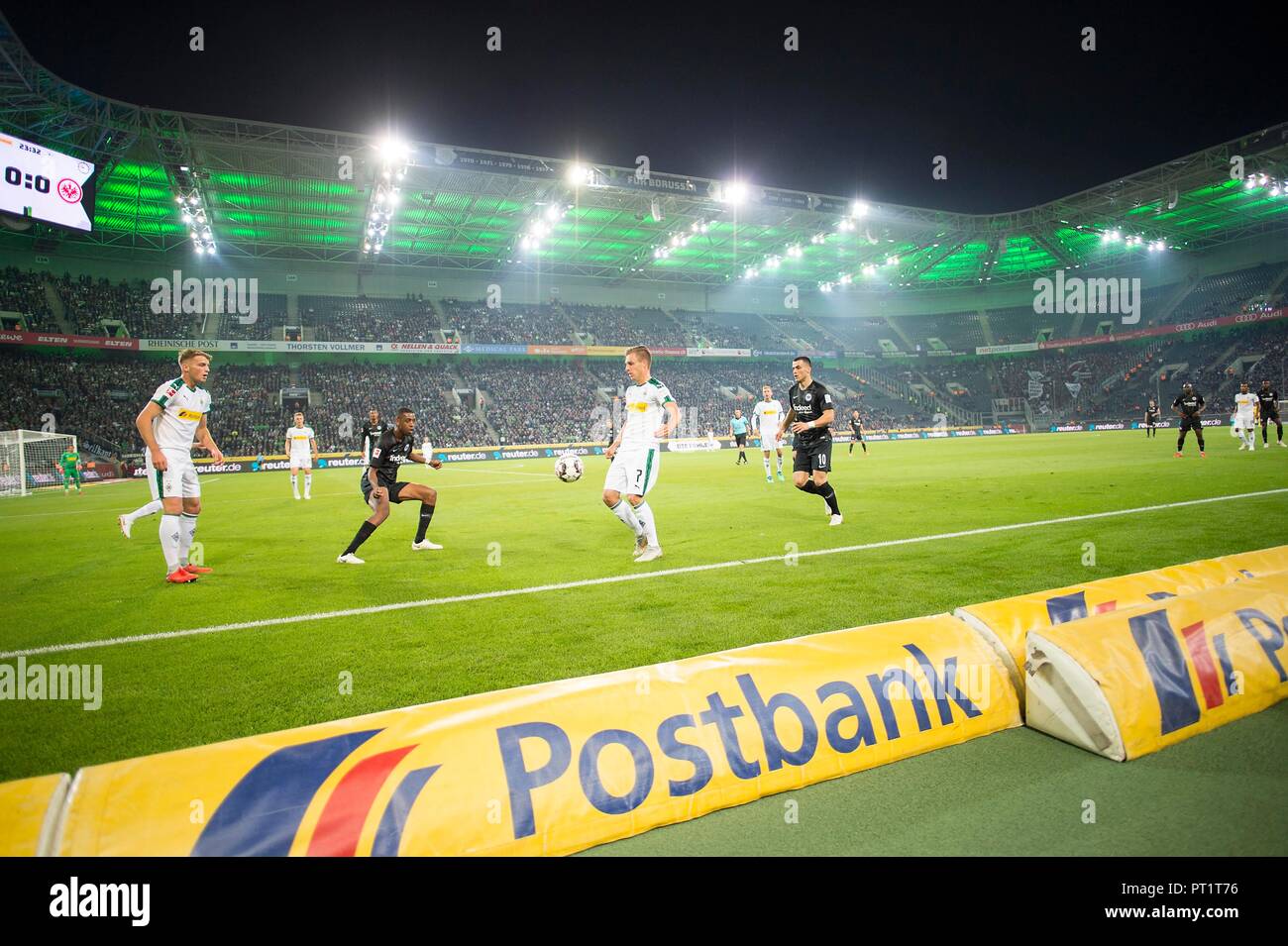 Monchengladbach, Deutschland. 26th Sep, 2018. Feature, game scene in the stadium in Borussia Park, Borussia Park, action, left to right Louis Jordan BEYER (MG), GELSON FERNANDES (F), Patrick HERRMANN (MG), Filip KOSTIC (F), in front of a Postbank advertising band, football 1.Bundesliga, 5.matchday, Borussia Monchengladbach (MG) - Eintracht Frankfurt (F) 3: 1 on 26.09.2018 in Borussia Monchengladbach/Germany. ## DFL regulations prohibit any use of photographs as image sequences and/or quasi-video ## | usage worldwide Credit: dpa/Alamy Live News Stock Photo