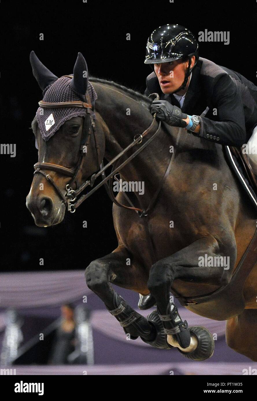 Birmingham, UK. 5th October 2018. Geoffroy De Coligny (FRA) riding 'Ramona Robinz'. International showjumping. Grandstand five fence challenge. Horse of the year show (HOYS). National Exhibition Centre (NEC). Birmingham. UK. 05/10/2018. Credit: Sport In Pictures/Alamy Live News Stock Photo