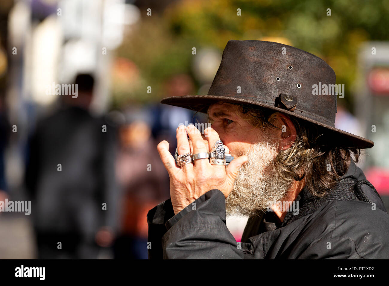 Dundee, Tayside, Scotland, UK. 5th October, 2018. Former X Factor 2017 audition contestant 'Fast Eddie' Lafferty is the harmonica playing busker and well known face on the streets of Dundee, Scotland. Eddie Lafferty has been playing the harmonica since he was 7 years old, nearly 50 years. This is Fast Eddie performing today and the streets are his stage. Credit: Dundee Photographics / Alamy Live News Stock Photo