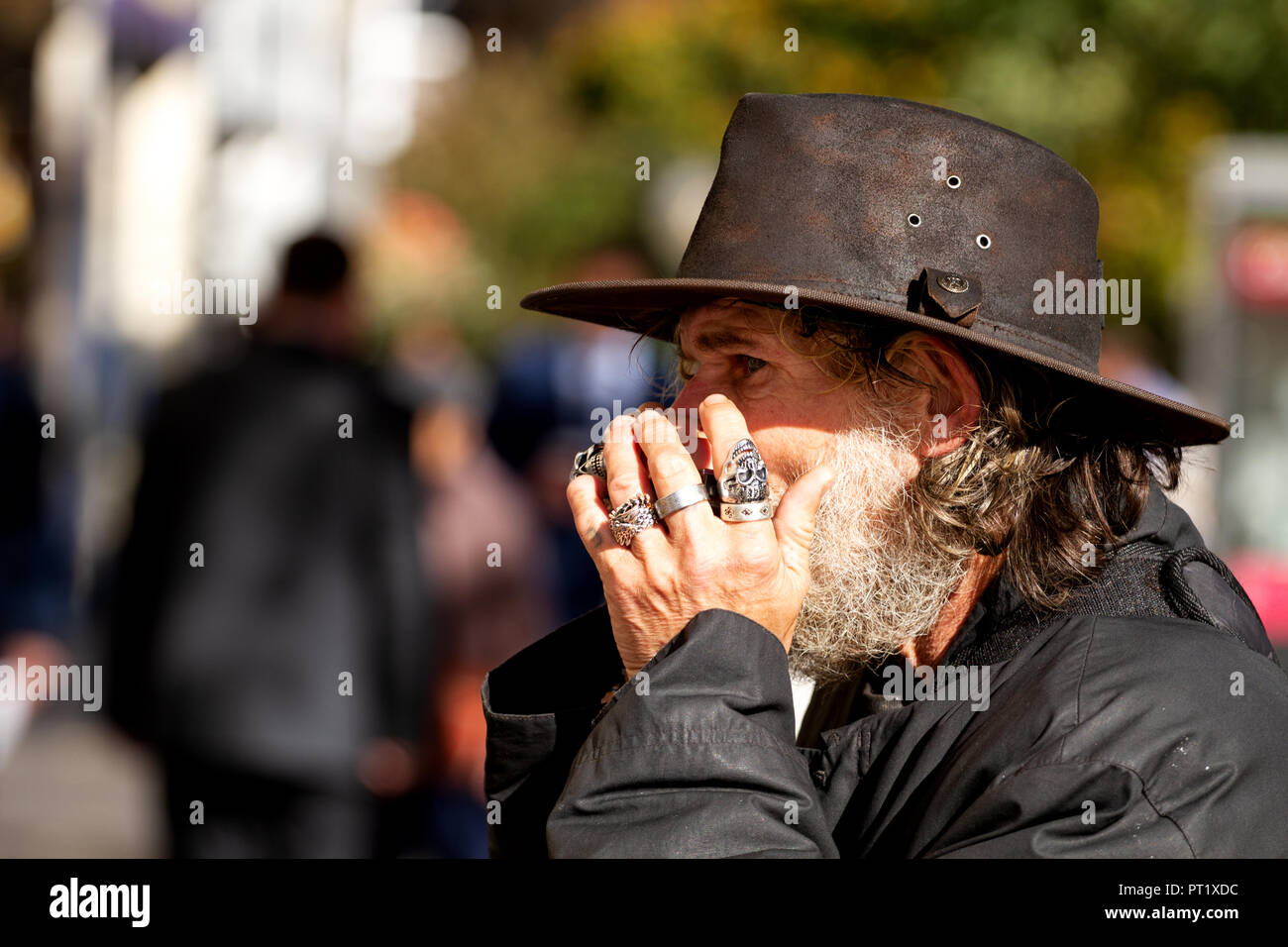 Dundee, Tayside, Scotland, UK. 5th October, 2018. Former X Factor 2017 audition contestant 'Fast Eddie' Lafferty is the harmonica playing busker and well known face on the streets of Dundee, Scotland. Eddie Lafferty has been playing the harmonica since he was 7 years old, nearly 50 years. This is Fast Eddie performing today and the streets are his stage. Credit: Dundee Photographics / Alamy Live News Stock Photo