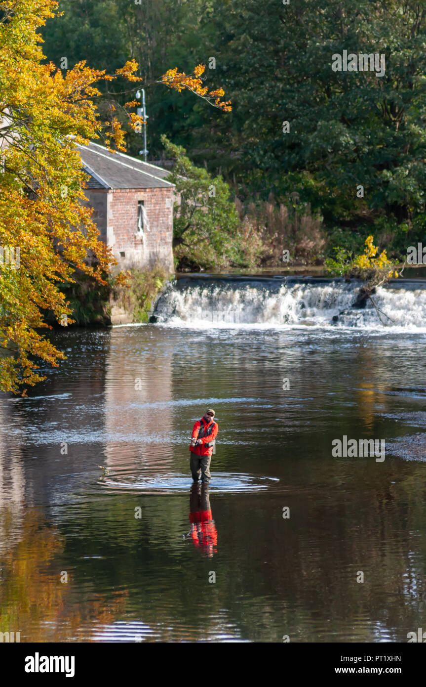 Glasgow, Scotland, UK. 5th October, 2018. UK Weather A man fly fishing