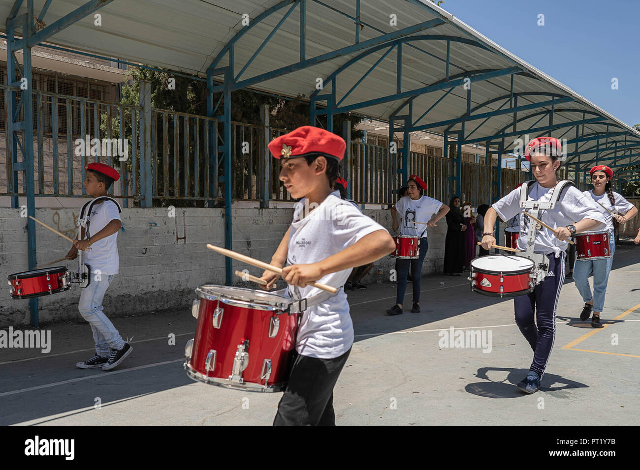 Bethlehem, Palestine. 13th Feb, 2018. The band seen playing during the summer camp.The Return Summer Camp was organised for children of the Aida refugee camp, it was established in 1950 by the Palestinians who were expelled from their homes from 27 towns throughout Palestine, namely Nasra, Tabaria, Jerusalem, Acre, Jaffa, Haifa and Hebron. This is a 4th generation of refugees, 130 children ranging from 4 to 16 years of age being overlooked by 20 instructors and volunteers and it was funded by the UN until 2000. Credit: Enzo Tomasiello/SOPA Images/ZUMA Wire/Alamy Live News Stock Photo