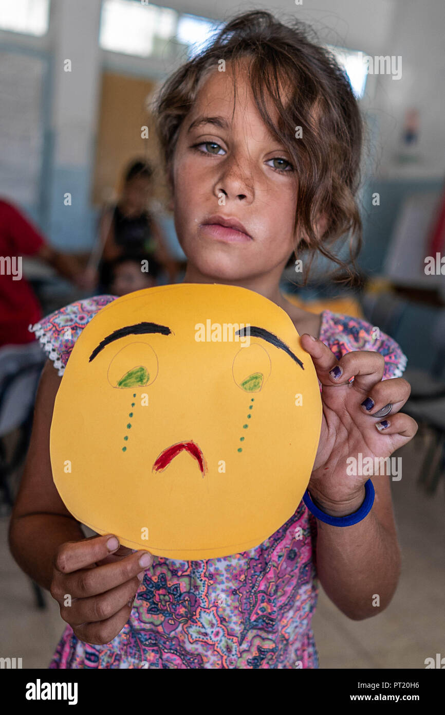 Bethlehem, Palestine. 8th Feb, 2018. Reem is seen sad because he sister does not love her any more during the summer camp.The Return Summer Camp was organised for children of the Aida refugee camp, it was established in 1950 by the Palestinians who were expelled from their homes from 27 towns throughout Palestine, namely Nasra, Tabaria, Jerusalem, Acre, Jaffa, Haifa and Hebron. This is a 4th generation of refugees, 130 children ranging from 4 to 16 years of age being overlooked by 20 instructors and volunteers and it was funded by the UN until 2000. (Credit Image: © Enzo Tomasiello/SOPA Stock Photo