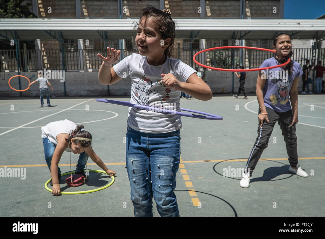 Bethlehem, Palestine. 8th Feb, 2018. Girls are seen playing during the summer camp.The Return Summer Camp was organised for children of the Aida refugee camp, it was established in 1950 by the Palestinians who were expelled from their homes from 27 towns throughout Palestine, namely Nasra, Tabaria, Jerusalem, Acre, Jaffa, Haifa and Hebron. This is a 4th generation of refugees, 130 children ranging from 4 to 16 years of age being overlooked by 20 instructors and volunteers and it was funded by the UN until 2000. Credit: Enzo Tomasiello/SOPA Images/ZUMA Wire/Alamy Live News Stock Photo