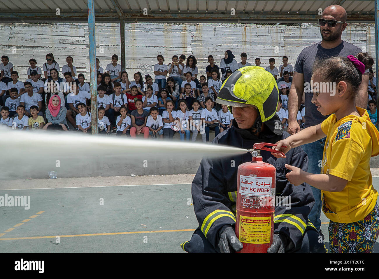 Bethlehem, Palestine. 15th Feb, 2018. Fire prevention seen being taught to the children during the summer camp.The Return Summer Camp was organised for children of the Aida refugee camp, it was established in 1950 by the Palestinians who were expelled from their homes from 27 towns throughout Palestine, namely Nasra, Tabaria, Jerusalem, Acre, Jaffa, Haifa and Hebron. This is a 4th generation of refugees, 130 children ranging from 4 to 16 years of age being overlooked by 20 instructors and volunteers and it was funded by the UN until 2000. (Credit Image: © Enzo Tomasiello/SOPA Images via Stock Photo