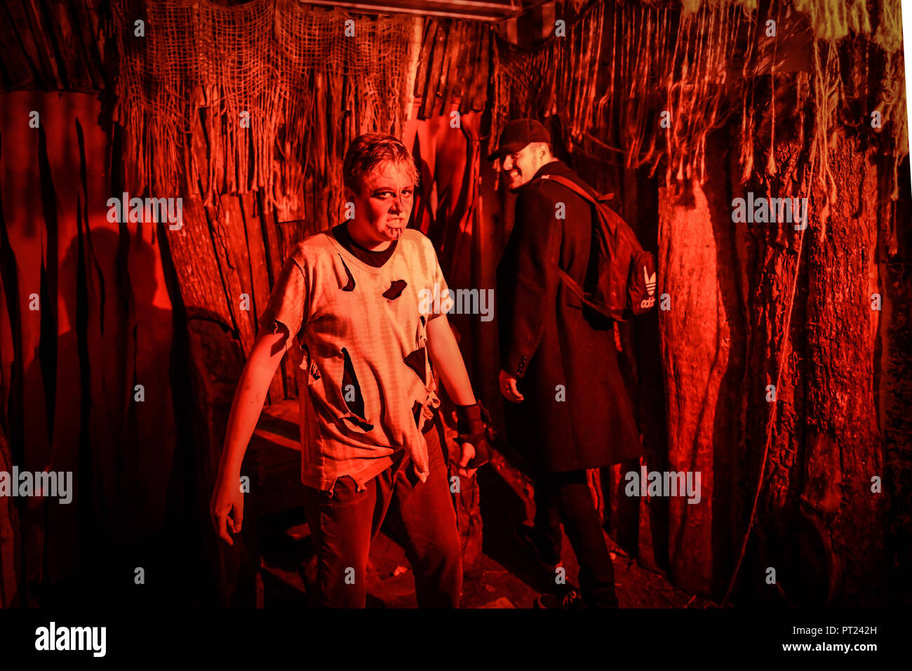 Crawley, UK. 5th October 2018. Stars of reality TV and VIP thrill seekers are out for the Press Night at Tulleys Shocktober Fest, Europe's biggest scare park in Crawley. All manner of ghouls, monsters and freaks scare visitors in the mazes and roam the park during the night. Credit: Thomas Faull/Alamy Live News Stock Photo