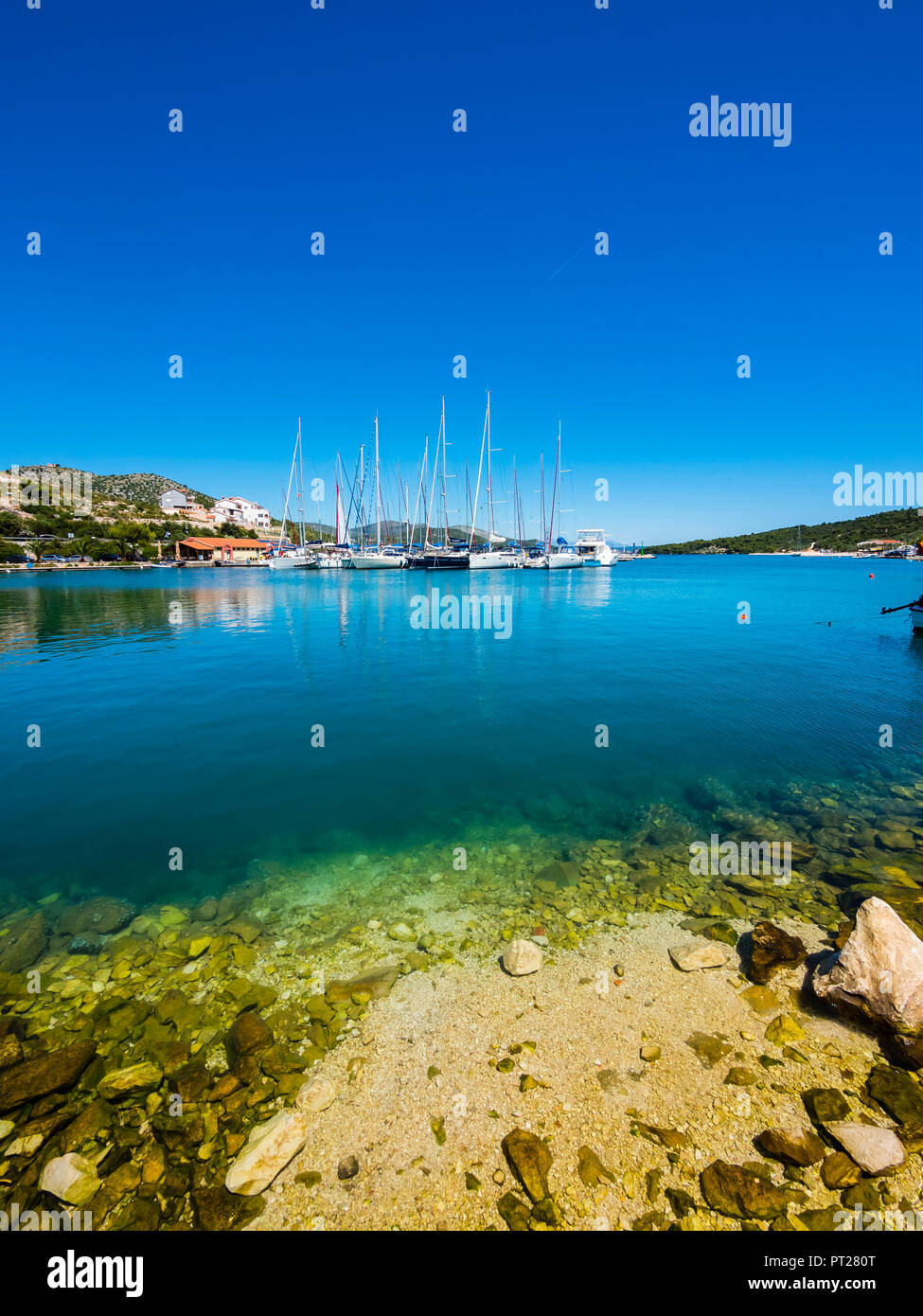 Croatia, Dalmatia, Adriatic Sea, Fishing village Marina, Bay with sailing boats Stock Photo