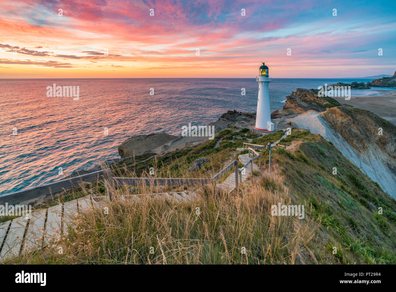 Castlepoint lighthouse at dawn, Castlepoint, Wairarapa region, North Island, New Zealand, Stock Photo