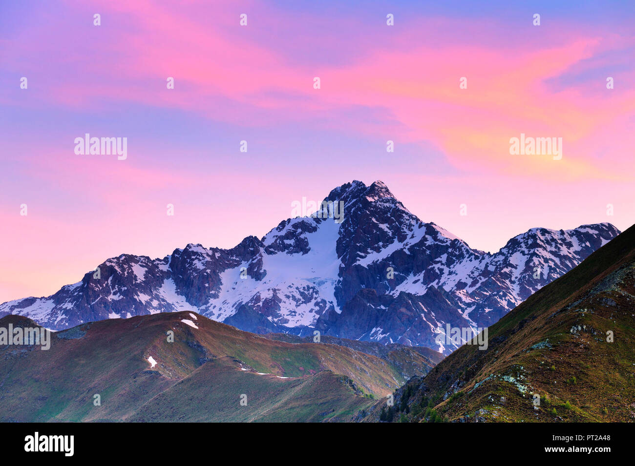 Colourful clouds above Mount Disgrazia during sunrise, Valtellina, Lombardy, Italy, Europe, Stock Photo