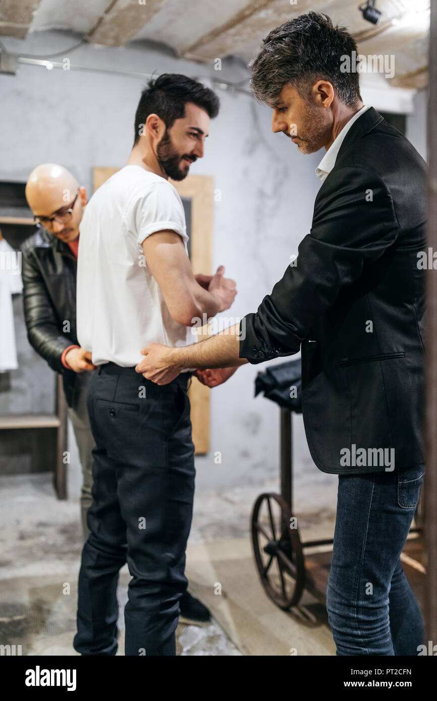 Two men fitting hi-res stock photography and images - Alamy