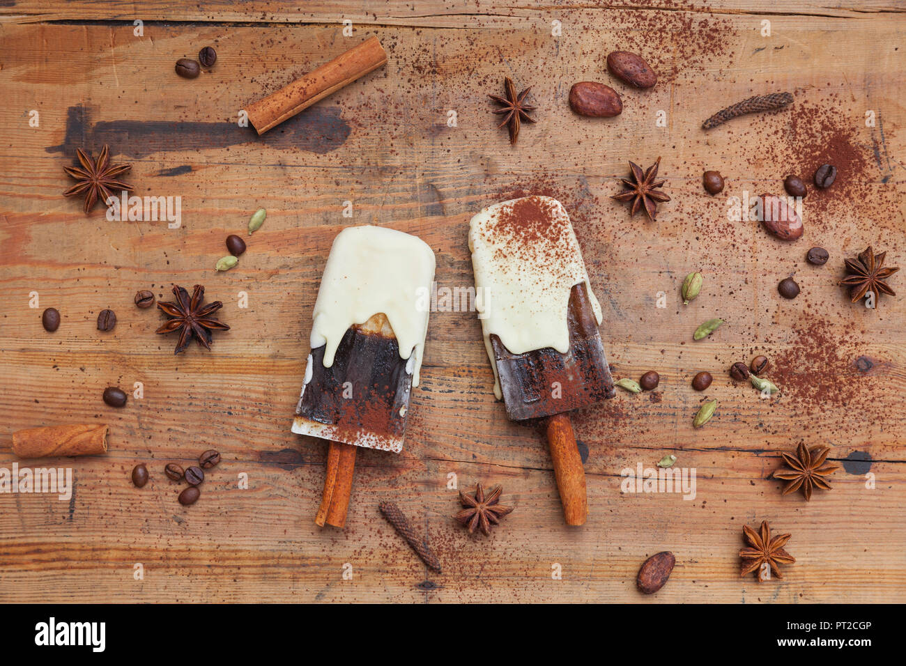 Homemade coffee and white chocolate ice lollies with winter spices ...