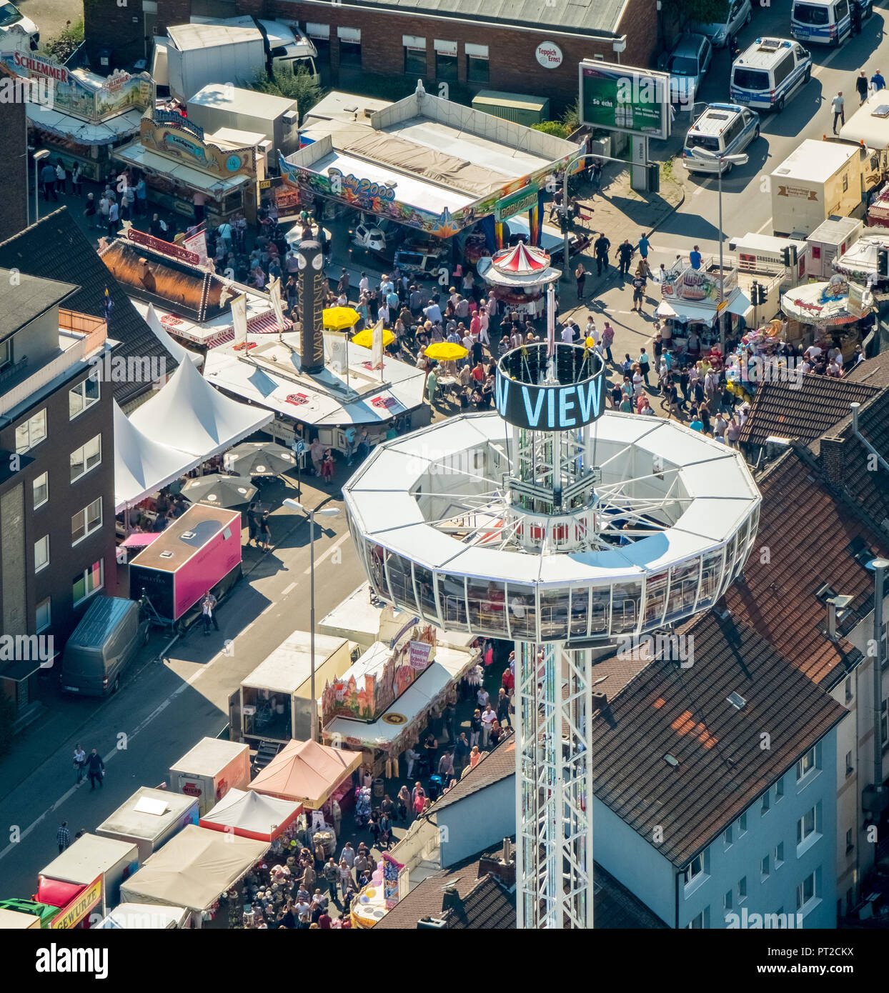 582. Cranger Kirmes, funfair carousel, lookout tower, rides, fun fair attractions, folk festival, public, chairoplane, Herne, Ruhr area, North Rhine-Westphalia, Germany Stock Photo