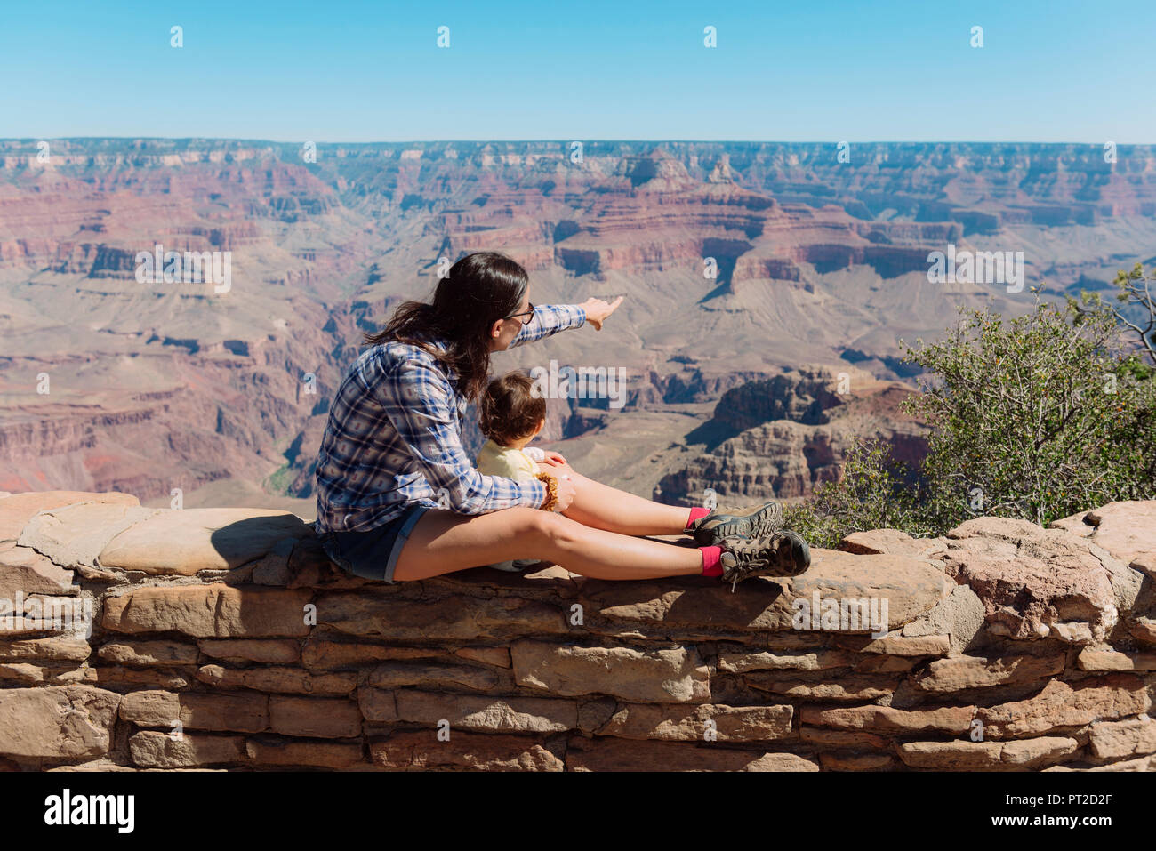 USA, Arizona, Grand Canyon National Park, Grand Canyon, mother and little daughter looking at view Stock Photo