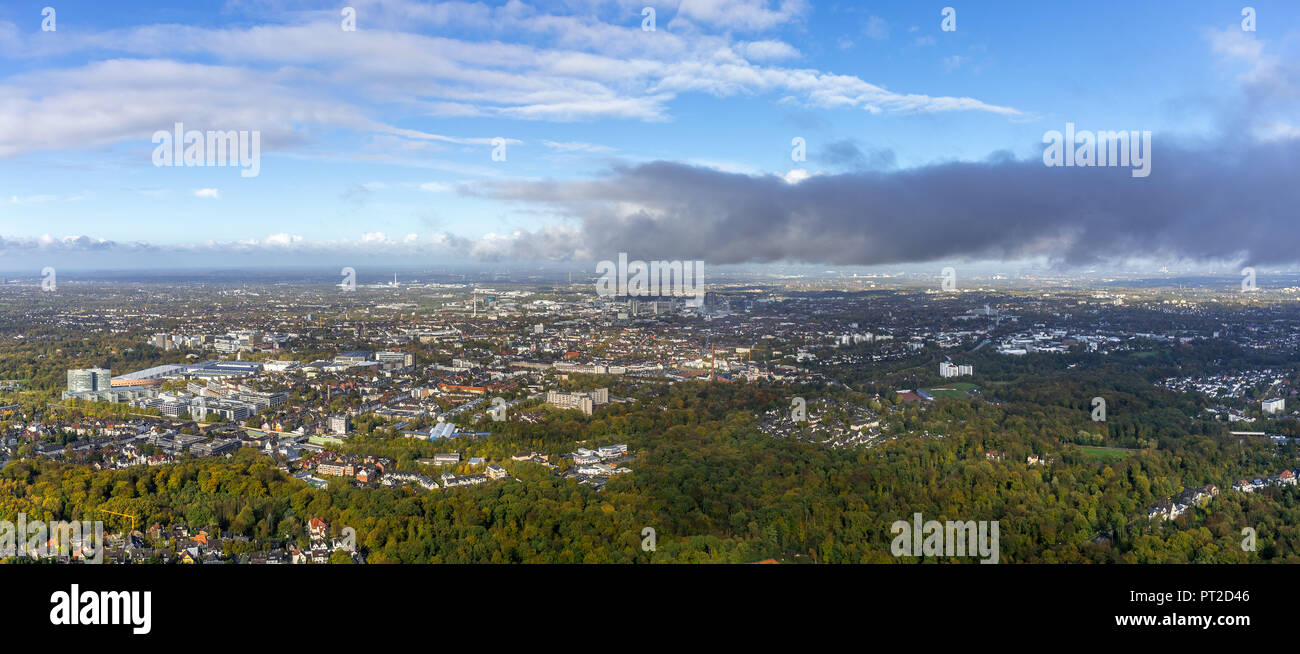 Essen-Rüttenscheid with the Gruga and Messe Essen (left) after the passage of a storm front, clouds lying low, Essen, Panorama, Ruhr area, North Rhine-Westphalia, Germany Stock Photo