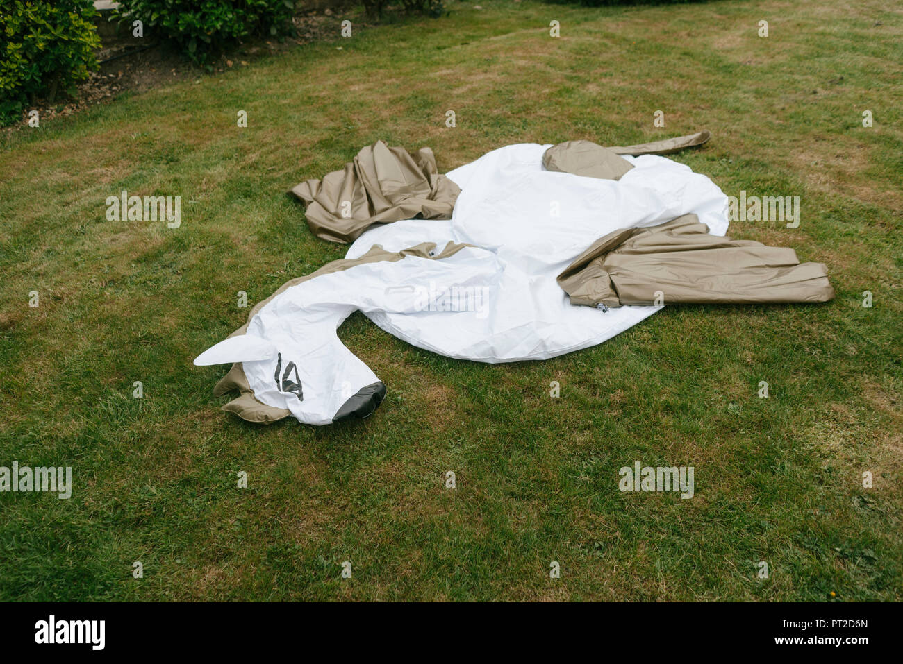Empty inflatable pool toy on lawn Stock Photo Alamy