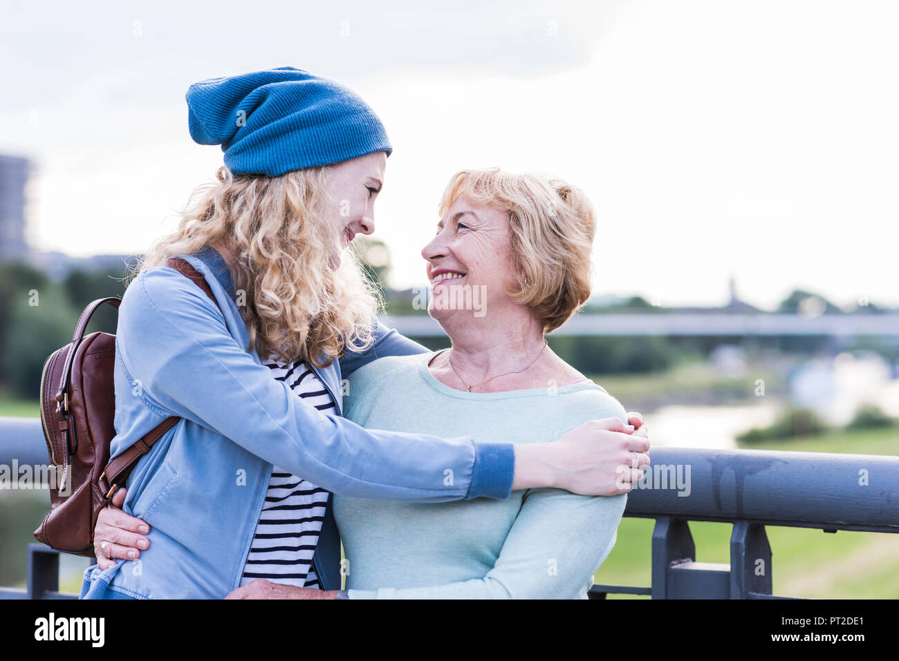 Happy grandmother face to face with her granddaughter Stock Photo