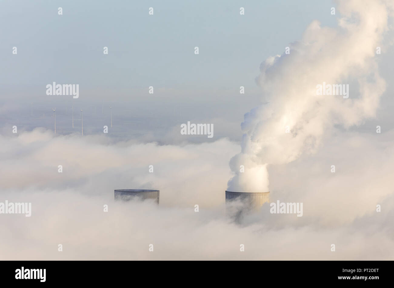 RWE Westfalen power plant, morning fog, clouds, the power plant emerging from the low cloud cover, Hamm, Ruhr area, North Rhine-Westphalia, Germany Stock Photo