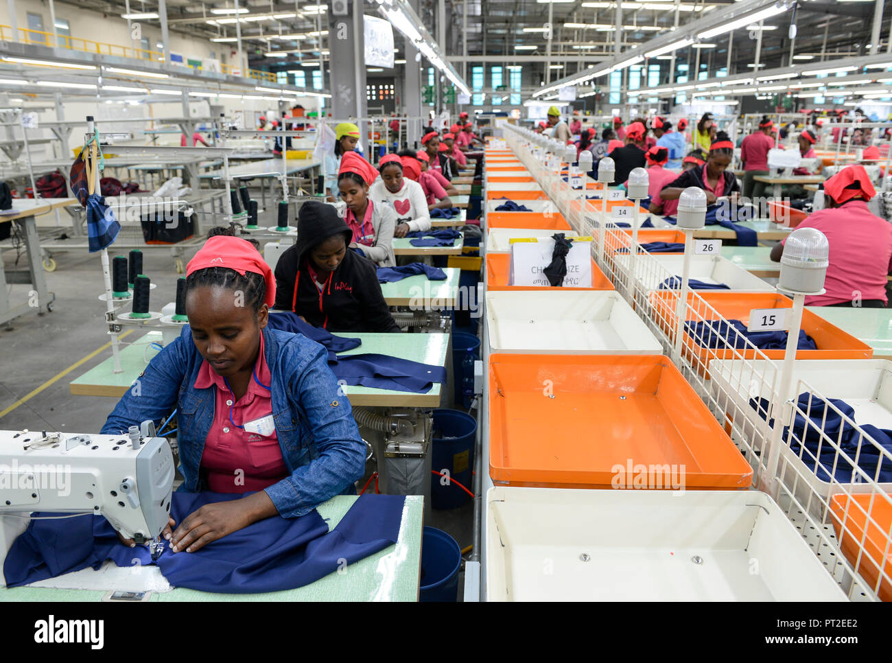 ETHIOPIA , Southern Nations, Hawassa or Awasa, Hawassa Industrial Park, chinese-built for the ethiopian government to attract foreign investors with low rent and tax free to establish a textile industry and create thousands of new jobs, taiwanese company Everest Textile Co. Ltd.produces textiles from synthetic fabric for export / AETHIOPIEN, Hawassa, Industriepark, gebaut durch chinesische Firmen fuer die ethiopische Regierung um die Hallen fuer Textilbetriebe von Investoren zu vermieten, taiwanesische Firma Everest Textile Co. Ltd. produziert Textilien aus synthetischen Stoffen fuer den Expor Stock Photo