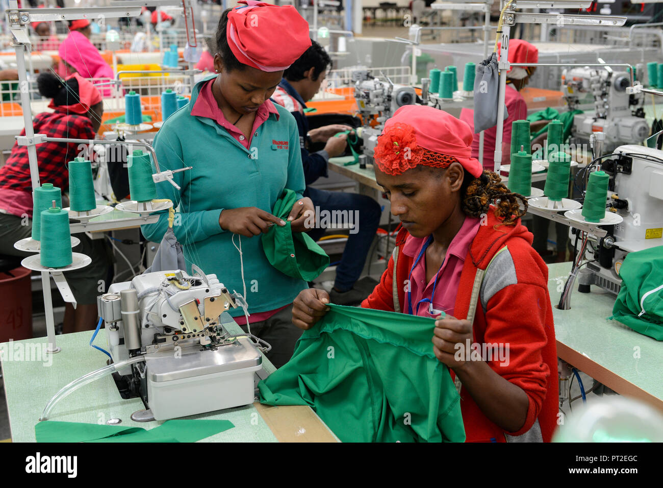 ETHIOPIA , Southern Nations, Hawassa or Awasa, Hawassa Industrial Park, chinese-built for the ethiopian government to attract foreign investors with low rent and tax free to establish a textile industry and create thousands of new jobs, taiwanese company Everest Textile Co. Ltd.produces textiles from synthetic fabric for export / AETHIOPIEN, Hawassa, Industriepark, gebaut durch chinesische Firmen fuer die ethiopische Regierung um die Hallen fuer Textilbetriebe von Investoren zu vermieten, taiwanesische Firma Everest Textile Co. Ltd. produziert Textilien aus synthetischen Stoffen fuer den Expor Stock Photo