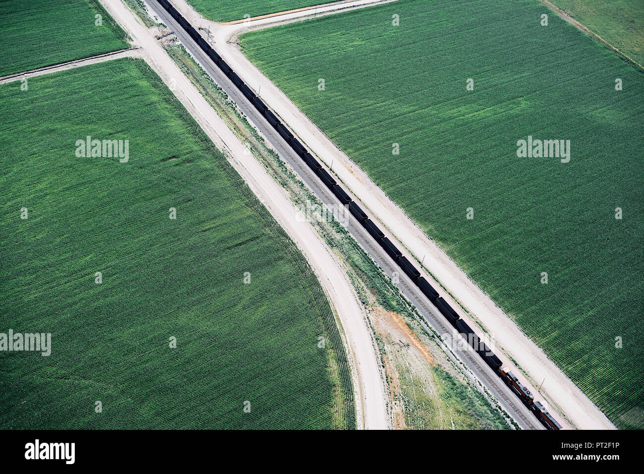 USA, Aerial of canal and farm roads dividing fields in Western Nebraska Stock Photo