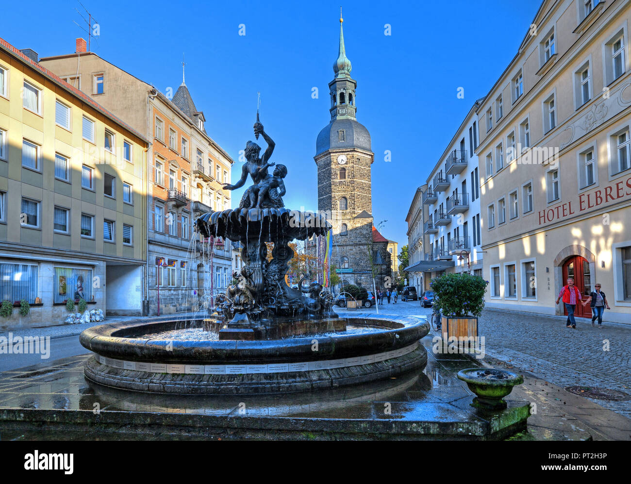 Fountain on the market square with St. John's Church, Bad Schandau, Elbe Sandstone Mountains, Saxon Switzerland, Saxony, Germany Stock Photo