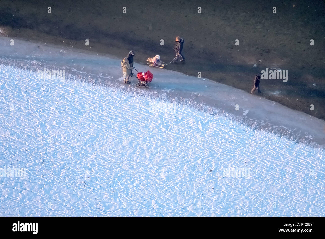 Sandbank with ice on the southern shore of the lake, winter weather, low tide on Möhnesee, Sauerland Stock Photo