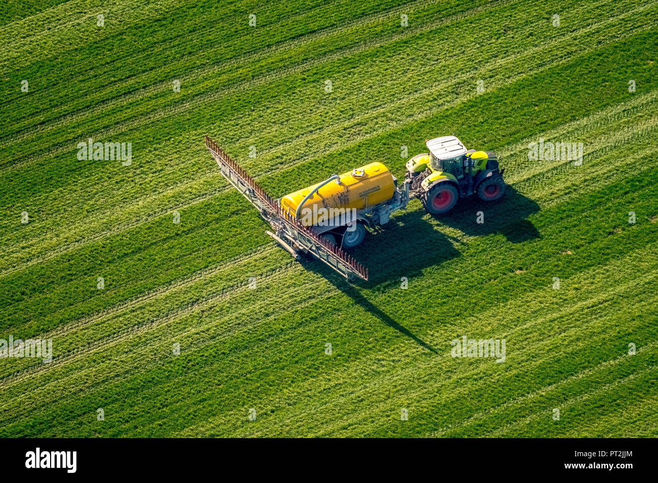 Tractor with pesticide shot, environmental toxins, fertilizer, Holsterhausen, Dorsten, Ruhr area, North Rhine-Westphalia, Germany Stock Photo